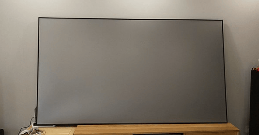 Light-Resistant Screen vs White Wall-which is better for projector?