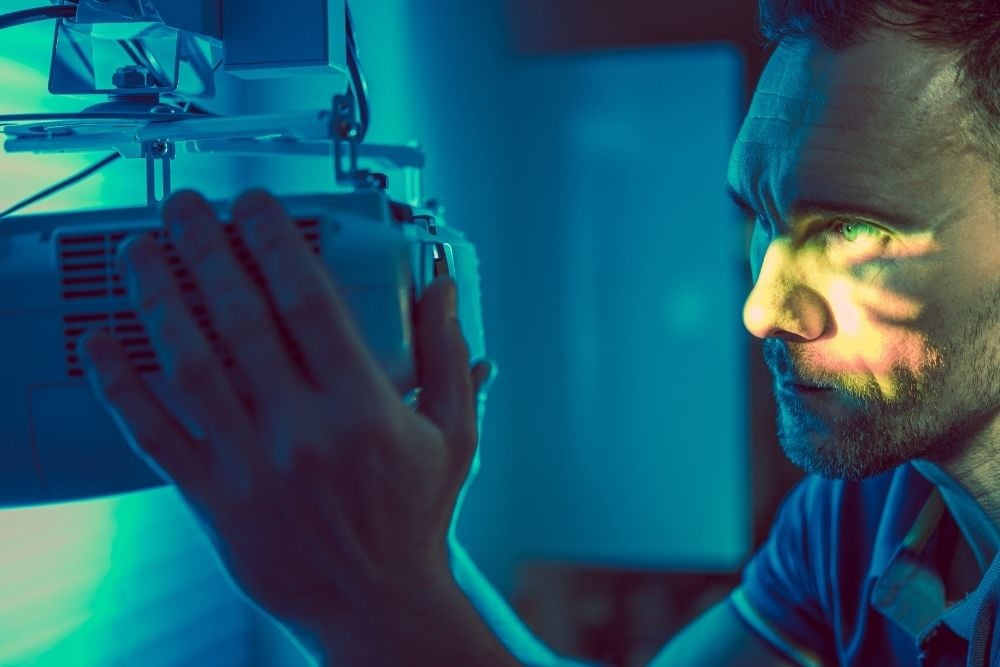 man-looks-directly-to-the-projector.jpg