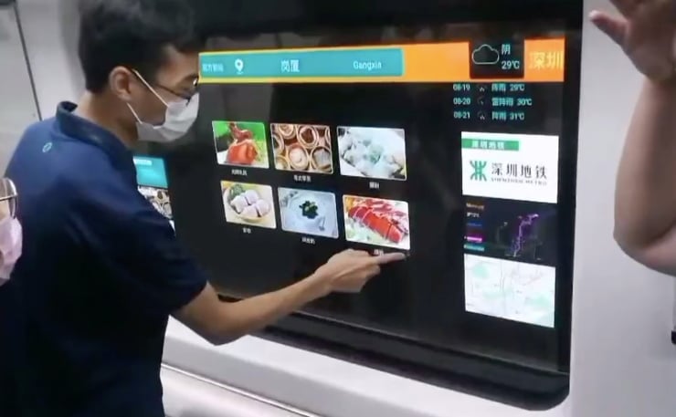Transparent TV (smart window) appeared on train in Shenzhen City, China